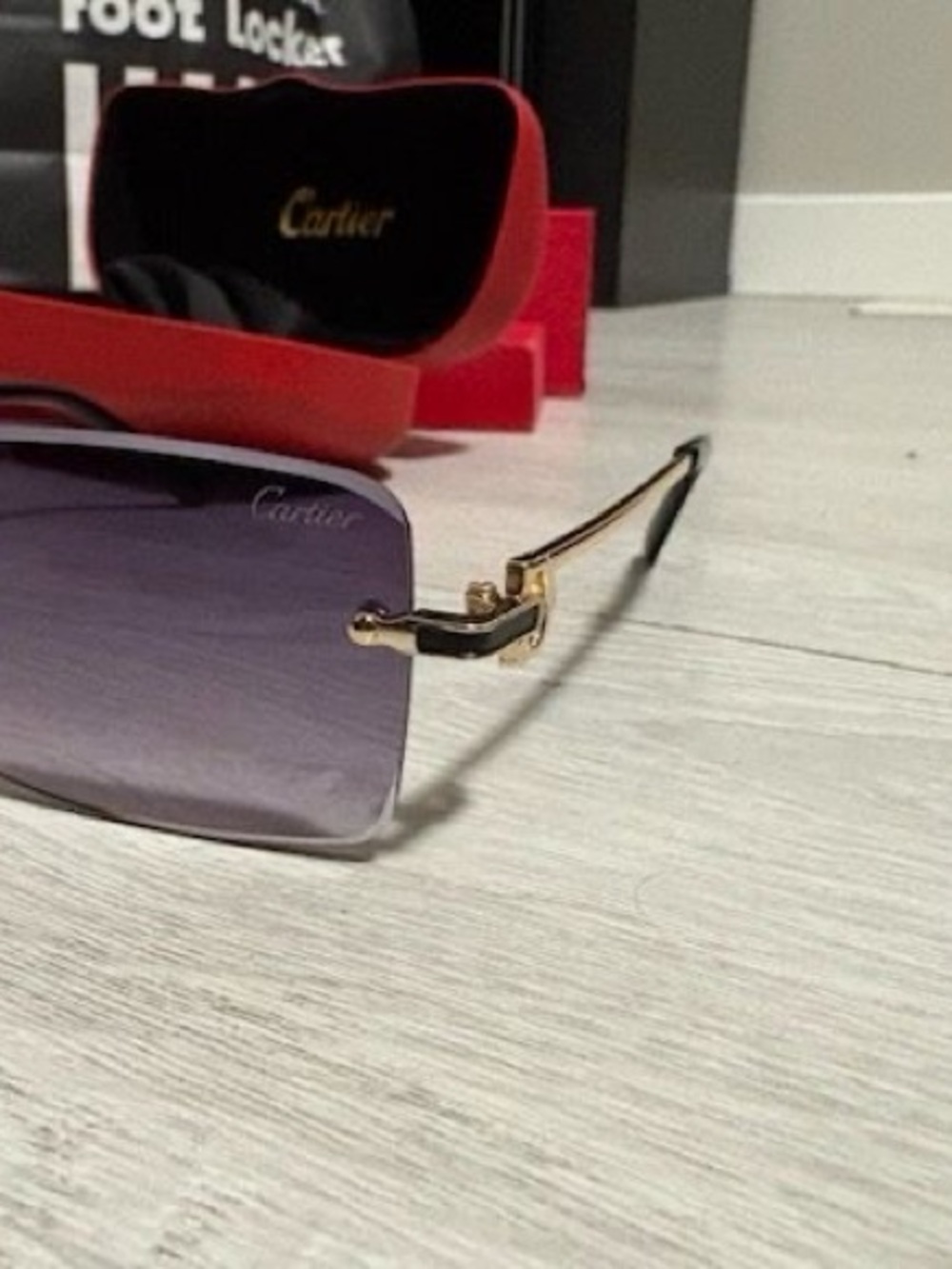 Cartier Women's Rimless Sunglasses with Purple Gradient Lenses and Gold Temples